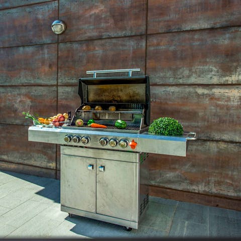 Enjoy an afternoon barbecue out on the pool deck