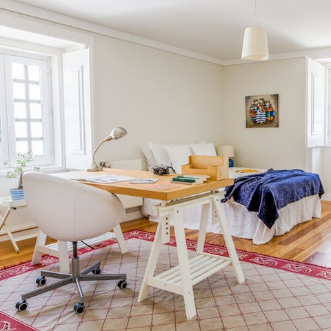 Work from home in the bedroom or write a journal of your stay in Lisbon 