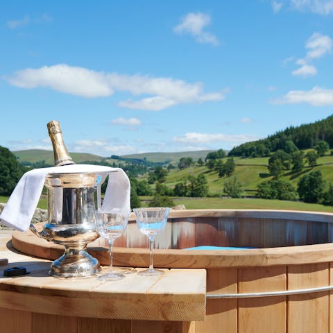 Relax in the hot tub overlooking the scenic Yorkshire Dales