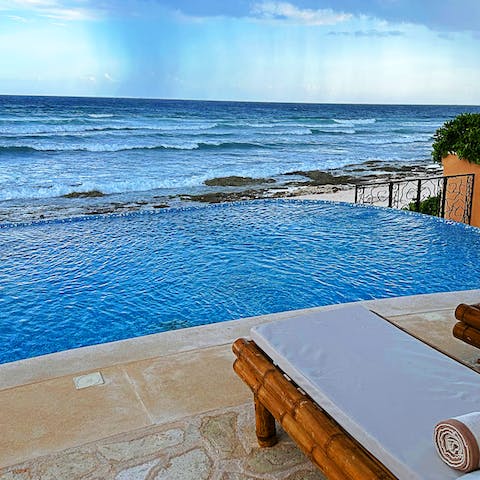 Take a dip in the gorgeous infinity pool, or head down to the beach just beyond