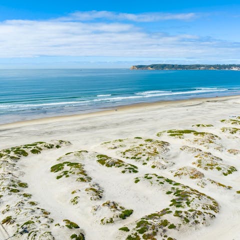 Go for an afternoon stroll along the nearby sandy beach