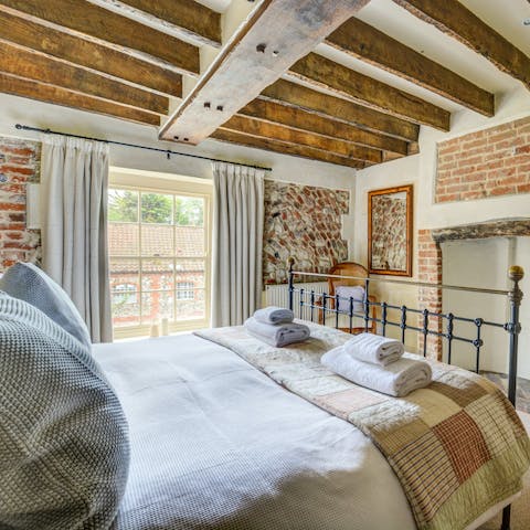 Wake up blissfully in your Tudor period beamed bedroom