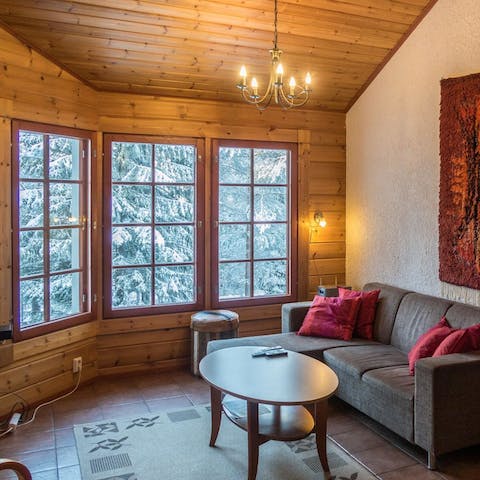 Enjoy snowy vistas from the big cottage-style windows