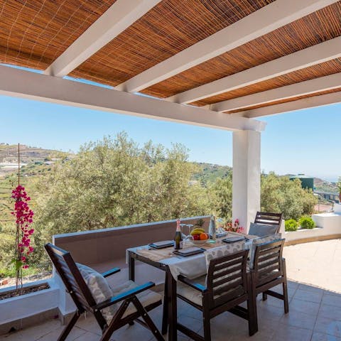 Fire up the barbecue for an alfresco meal beneath the pergola