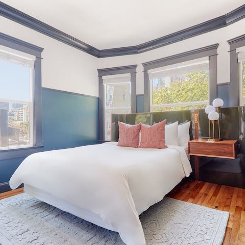 Wake up to leafy Downtown views from the comfort of the bed