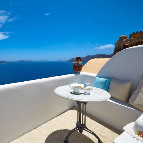 Sip your morning coffee as you gaze out at the sparkling Aegean Sea