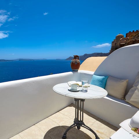 Sip your morning coffee as you gaze out at the sparkling Aegean Sea