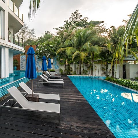 Take a refreshing dip in the communal swimming pool 