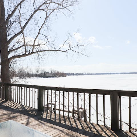 Enjoy stunning lakeside views throughout the home and on the balcony