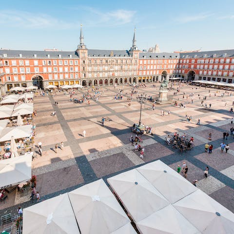 Look out over the pavement cafés and historic buildings of Plaza Mayor