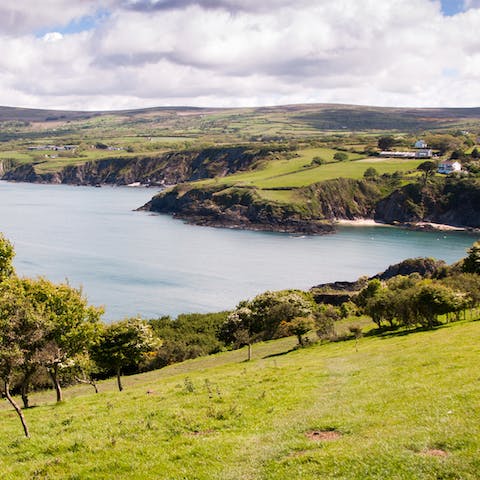 Walk twenty-five minutes to join the Pembrokeshire Coast Path and witness the beauty of south Wales