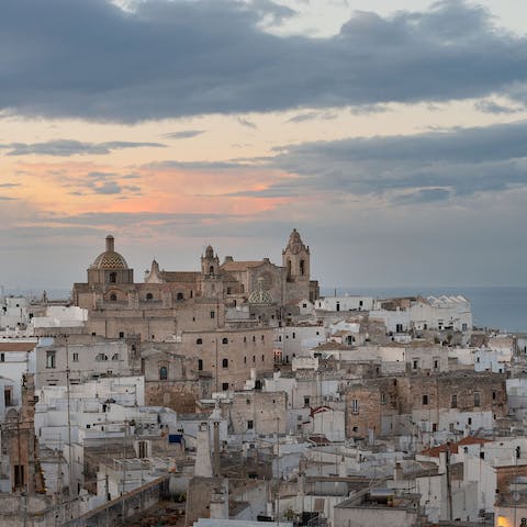 Fall in love with Ostuni's old cathedral, medieval gates, and archaeology