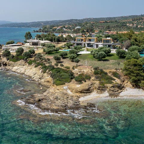 Share a private rocky beach with two other homes in the complex