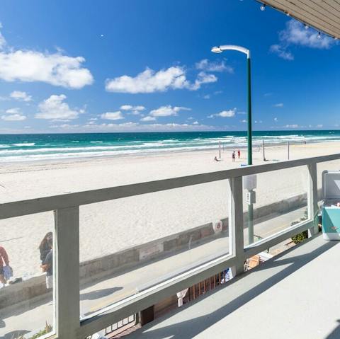 Sip your morning coffee on the beachfront balcony 