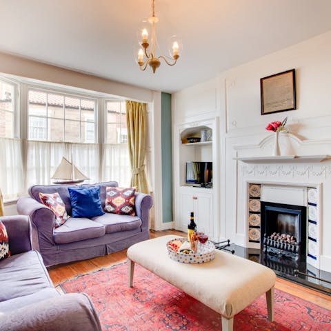 Snuggle up on the living room's comfortable sofas with a good book and your morning coffee
