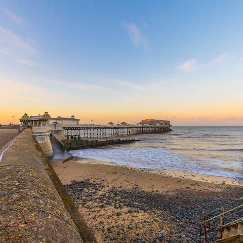 Take a seven-minute wander down to Cromer Pier to breathe in the sea air