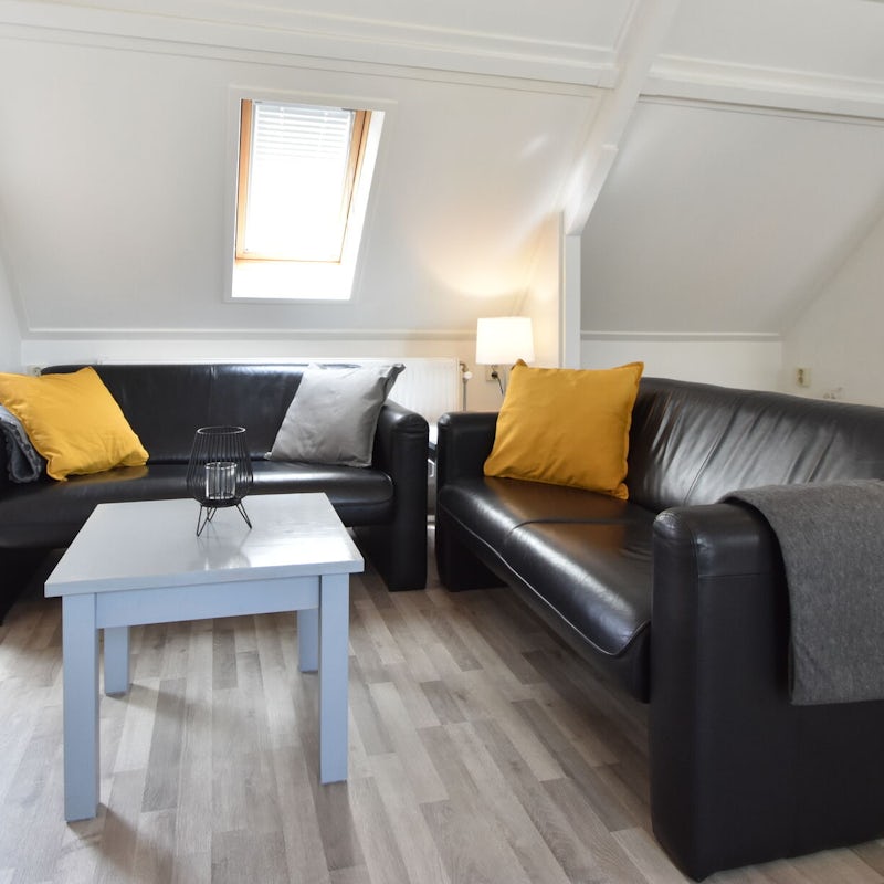 Snuggle up in the cosy living room, perfect for romantic evenings in