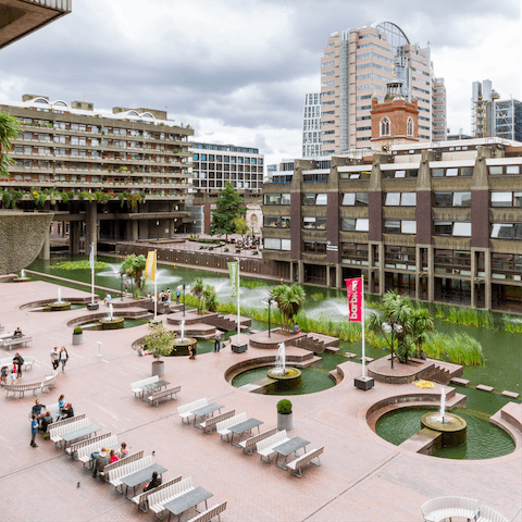 Soak up some culture and brutalist architecture at the Barbican Centre – a sixteen-minute walk