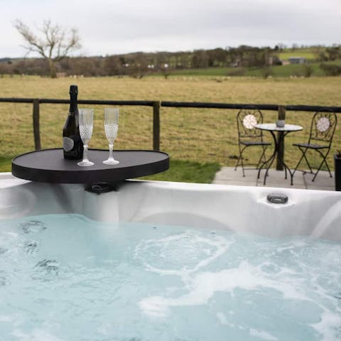 Enjoy a long soak in the outdoor hot tub