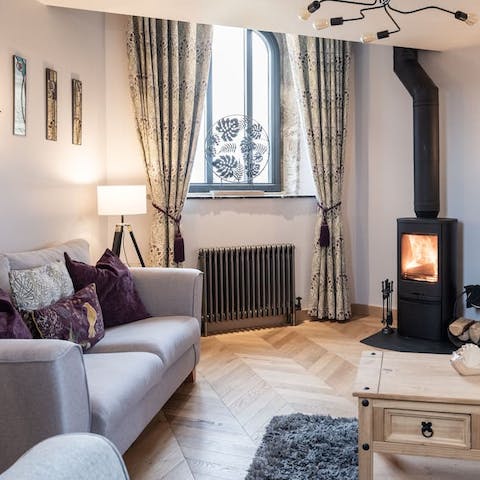 Get cosy around the wood-burning stove for a lovely night in