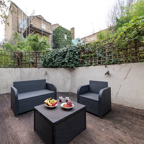 Tuck into an alfresco breakfast on the pretty patio