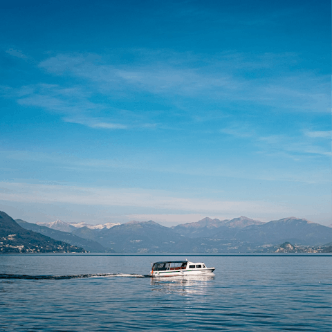 Hire a boat and take to the water on Lake Como