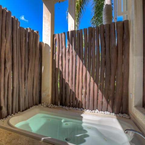 Head to the temperate Jacuzzi tub for a refreshing soak