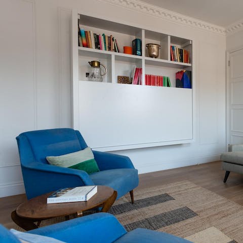 Read in a comfy armchair from a curated mini-library