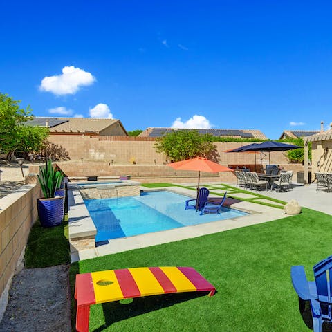 Plunge into the turquoise swimming pool for a refreshing dip on hot afternoons