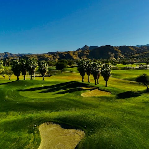 Tee off at the local golf course, just a twelve-minute drive away