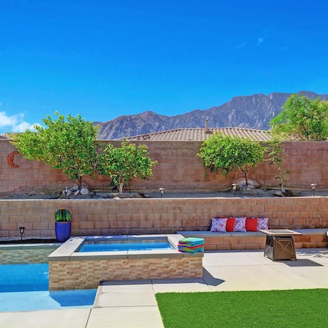 Sink into the hot tub and admire the spectacular mountain views