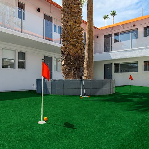 Hone your swing on the practice putting green