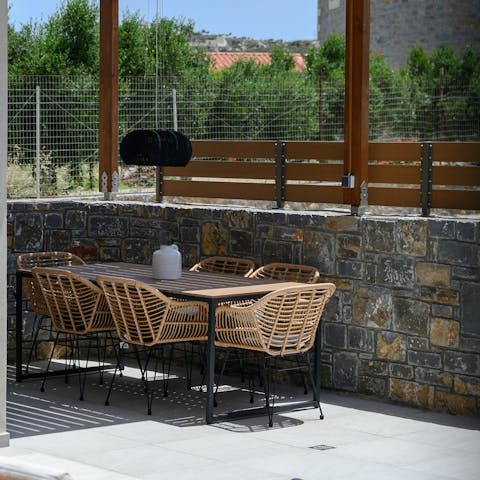 Light the barbecue and savour Cretan-inspired meals on the terrace