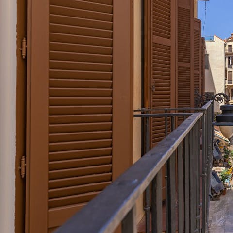 Sip your morning coffee on the Juliet balcony, overlooking the street below