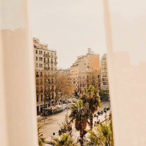 Admire the city's architecture from the private balcony