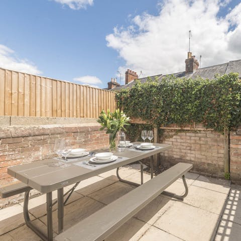 Catch the last of the evening sun in the private courtyard garden