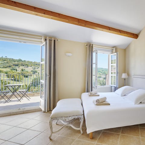 Soak up the green vistas from the top-floor main bedroom with en-suite