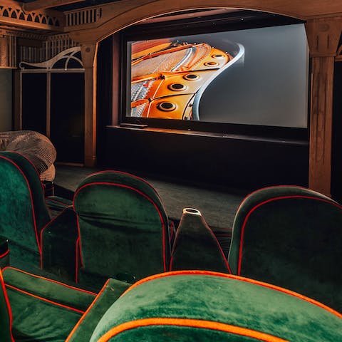Settle down to watch your favourite film in the private cinema room