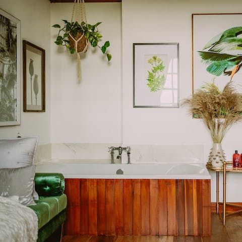 Run yourself a restorative bath in the tub in the corner of the bedroom