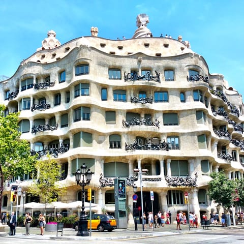 Stroll down to Casa Mila and take in some beautiful architectural history