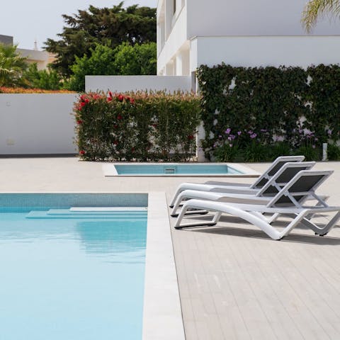 Start your day with a refreshing dip in one of the communal swimming pools