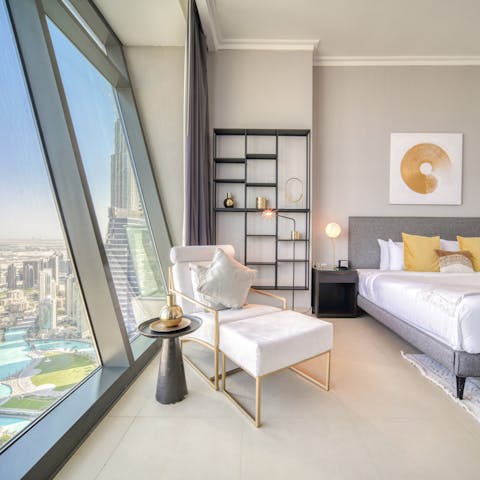Wake up to the Dubai skyline in the stylish bedrooms each morning
