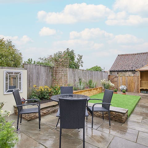 Enjoy your morning coffee on the garden table