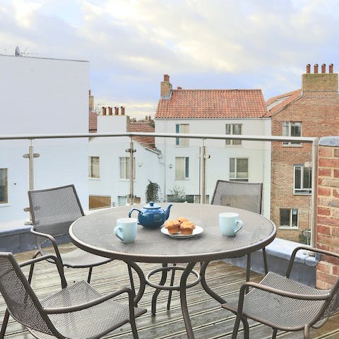 Have afternoon tea on the balcony with views over the lighthouse and church