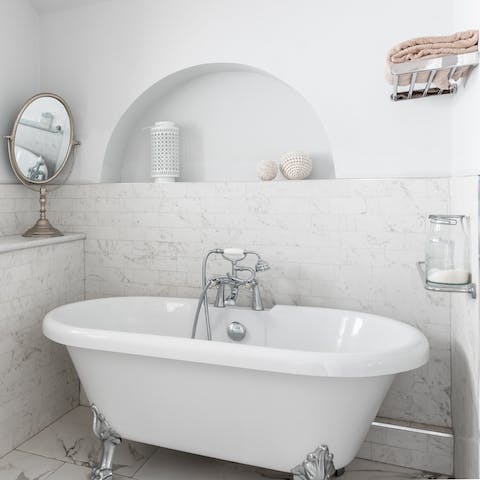 End the evening with a relaxing soak in the clawfoot bathtub
