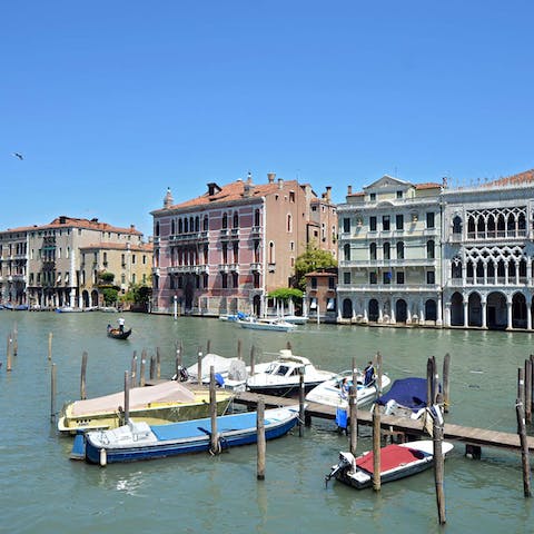 Sip on a glass of red as you look out over the canal