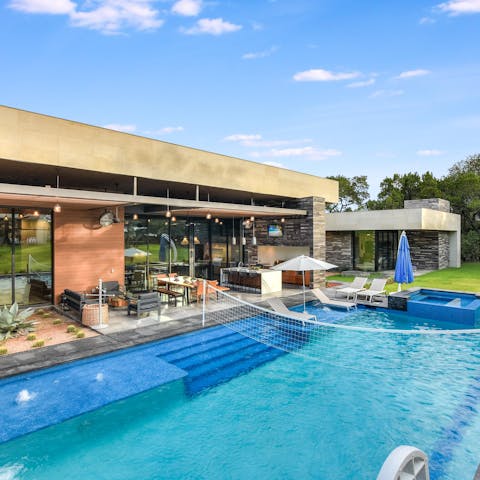 Play a few games of volleyball in the heated swimming pool