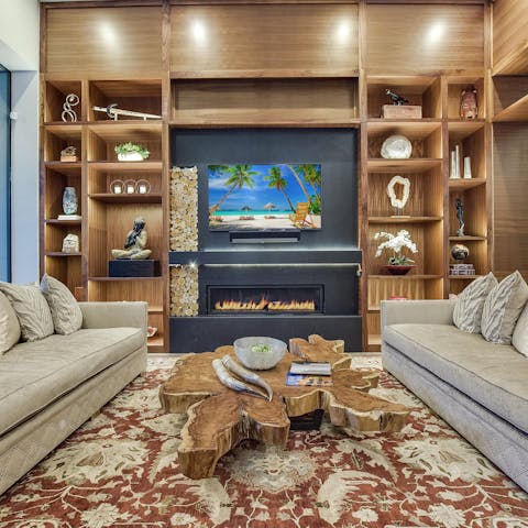 Snuggle up on the sofas next to the contemporary fireplace