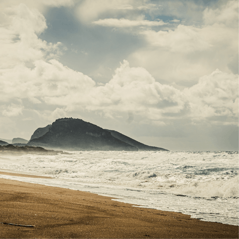 Take a stroll on the sands of Navarino Bay's beach