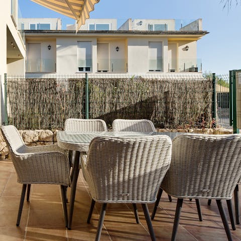Gather together for an alfresco barbecue feast on the private patio